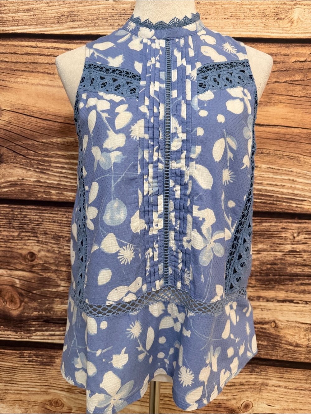 Sleeveless Blue Floral Pleated-Front Blouse